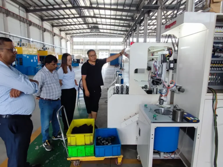Indian customer conducting factory acceptance testing of Angem's automatic bushing swaging machine with auto loading & unloading system